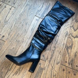Woman’s black boots with heel